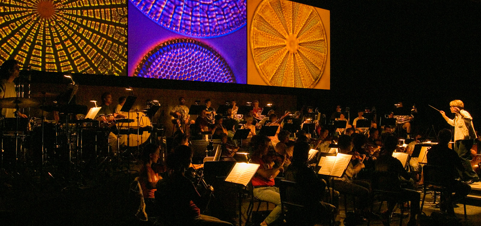 Marin Alsop conducting the multimedia performance of Frans Lanting's LiIFE; A Journey Through Time, Cabrillo Music Festival, Santa Cruz, California