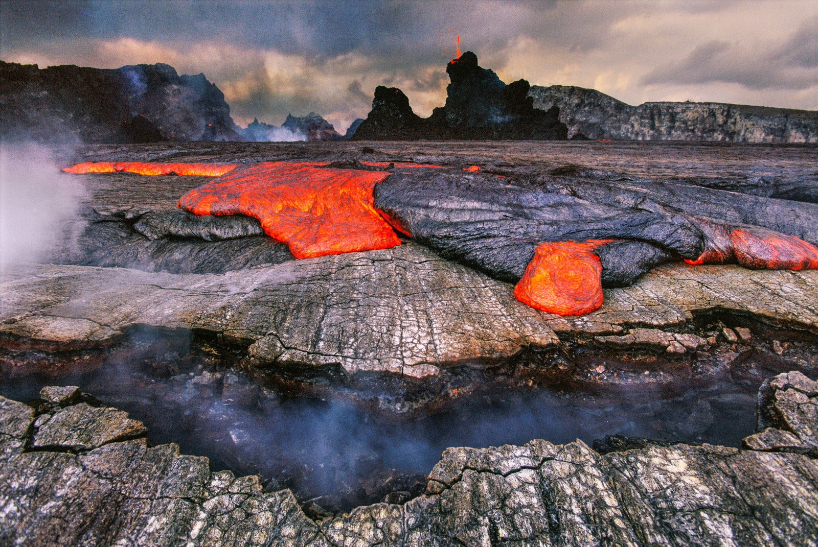 Lava overflowing caldera of Pu'u 'O'o, Hawaii Volcanoes National Park, Hawaii, USA