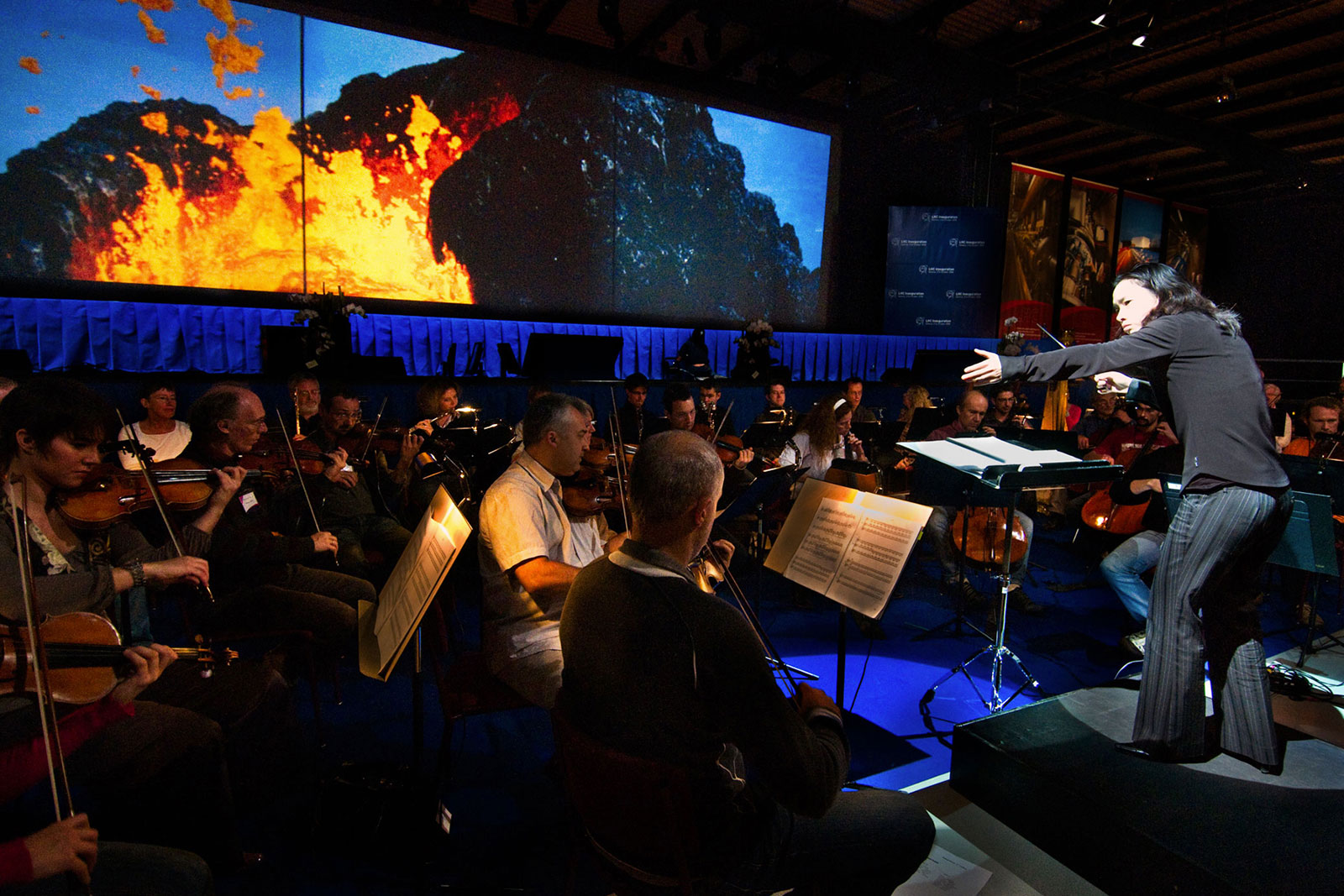 Carolyn Kuan conducting the multimedia production of Frans Lanting's Origins, Geneva, Switzerland